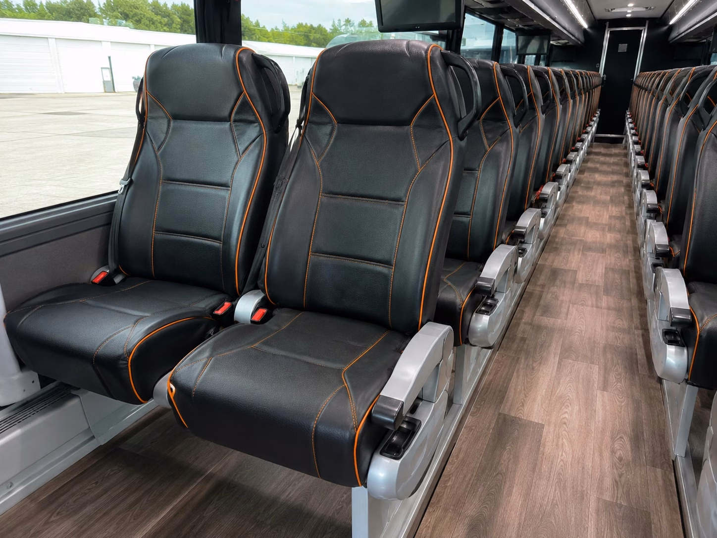 rather than splitting your team across rideshares keep everyone together on a private charter bus